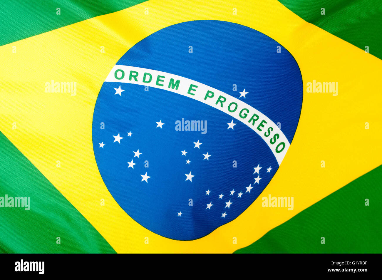 Background - Close up of the silky Brazilian flag Stock Photo