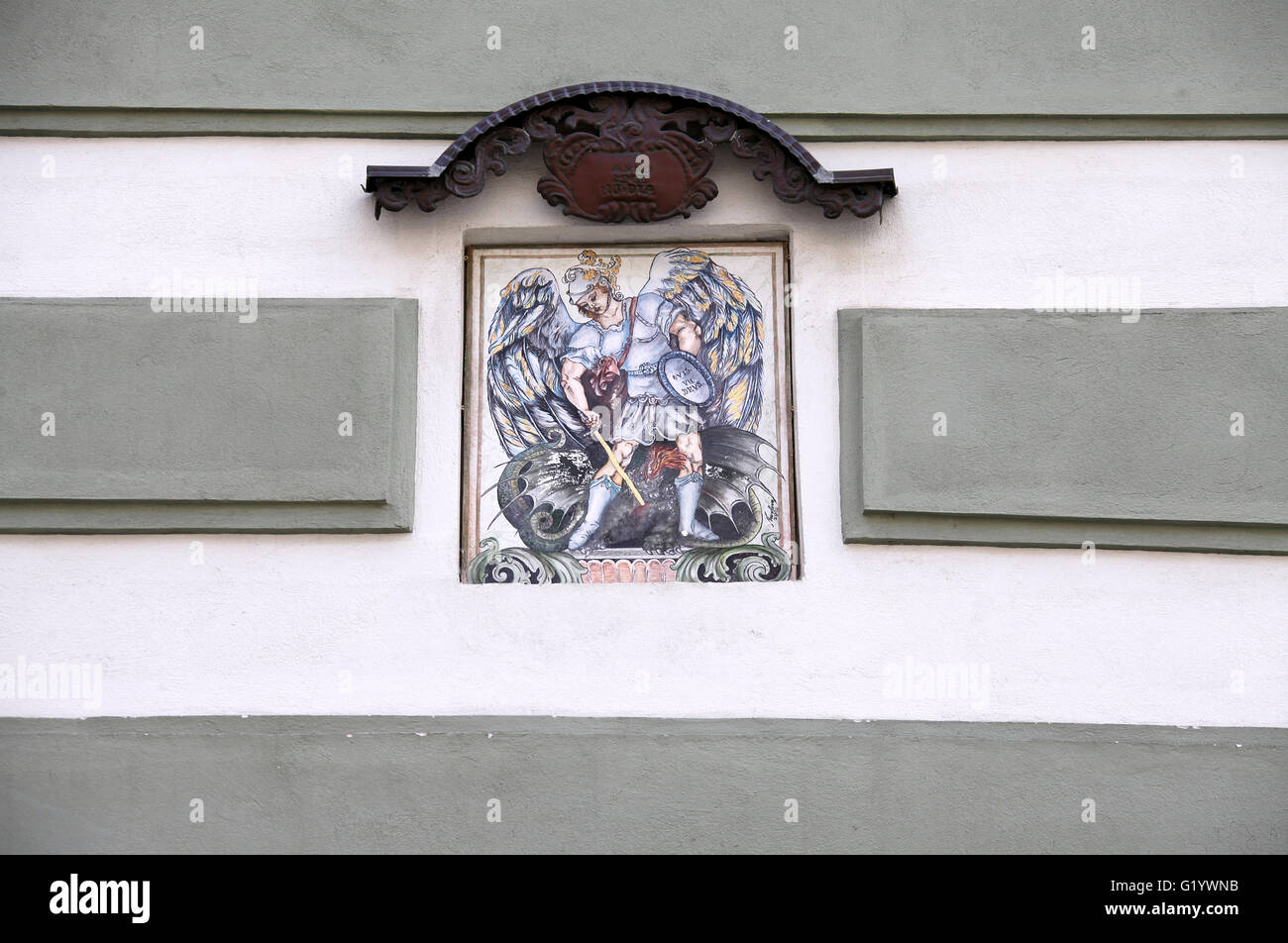 Painting of George and the Dragon on a building in the Old Town of Bratislava Stock Photo