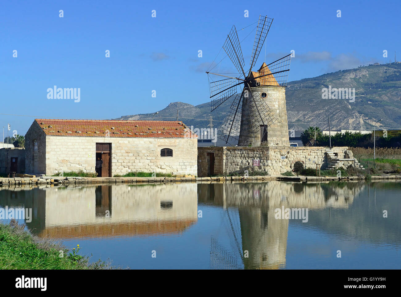 Saltworks, isola Grande island, windmill, Saline of Trapani, salt, nature reserve, Stagnone of Marsala, Sicily, Italy, Europe Stock Photo