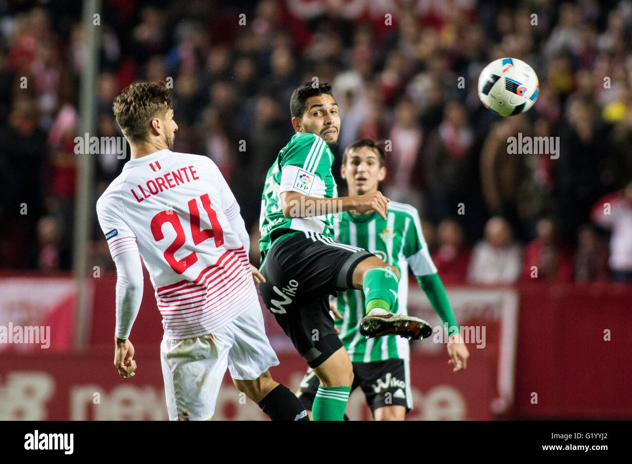 Fernando Llorente of Sevilla (L ) vies for the ball with Petros Matheus dos Santos Araujo of Real Betis (R ) during the match of King's Cup between Sevilla FC and Real Betis at the Ramon Sanchez Pizjuan Stadium in Sevilla, Spain, 12 January, 2016 Stock Photo