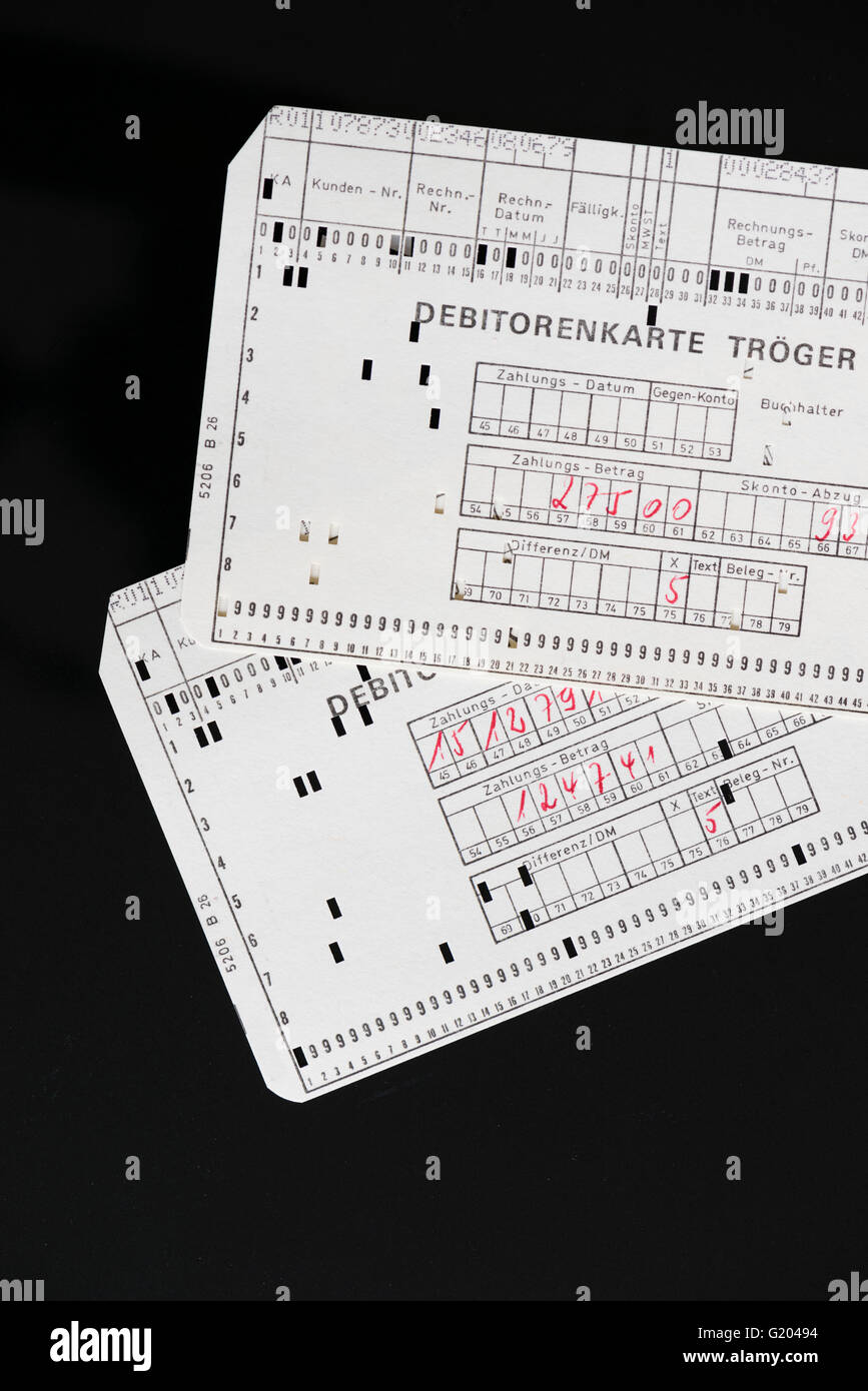 Computer punch cards used for an early computerized accounting system (running on a historic mainframe computer, circa 1970). Stock Photo