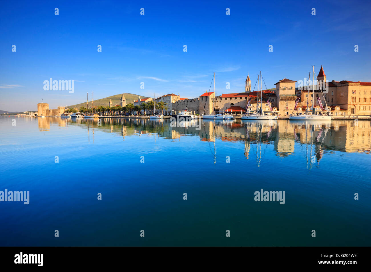 Reflection of Trogir town in Dalmatia on sea water surface Stock Photo