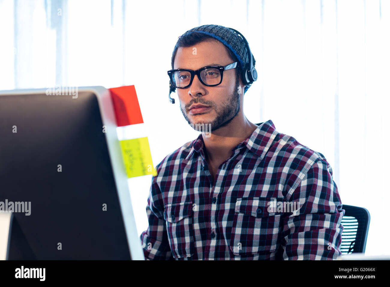 Portrait of man wearing headset Stock Photo Alamy