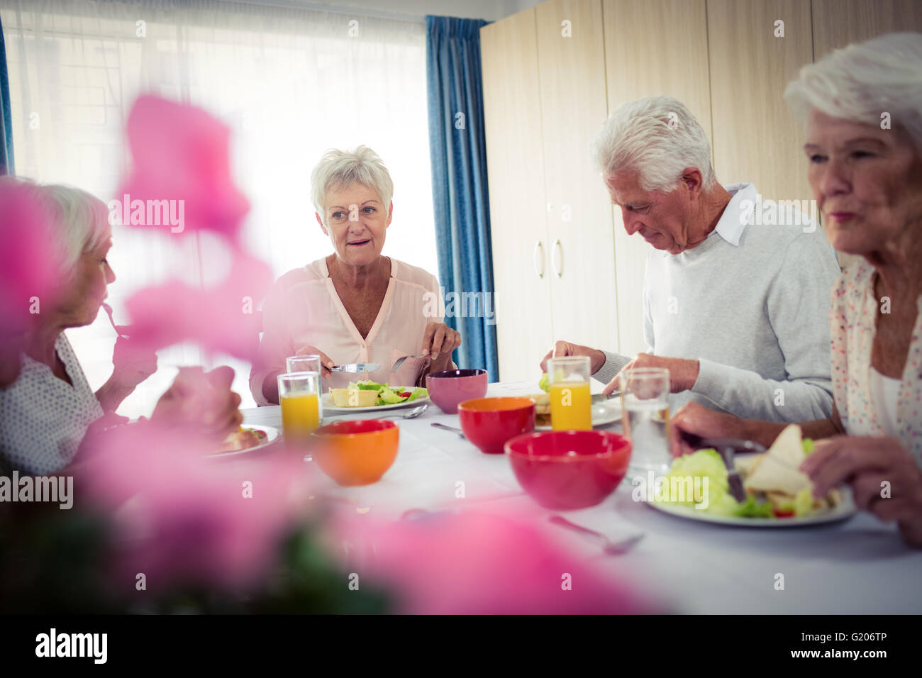 Pensioners at lunch Stock Photo