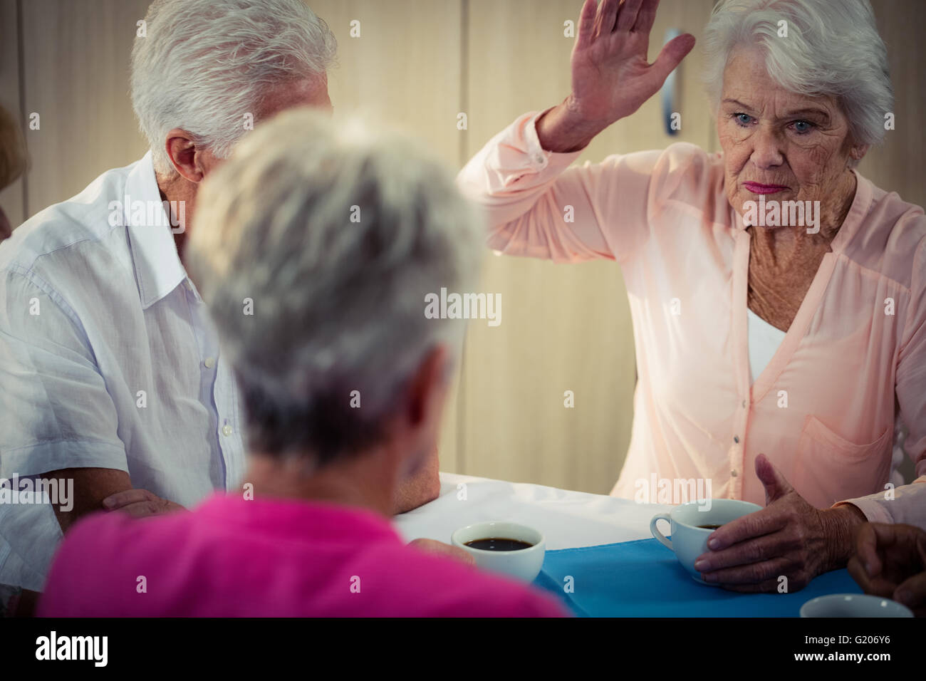 Pensioners interacting Stock Photo