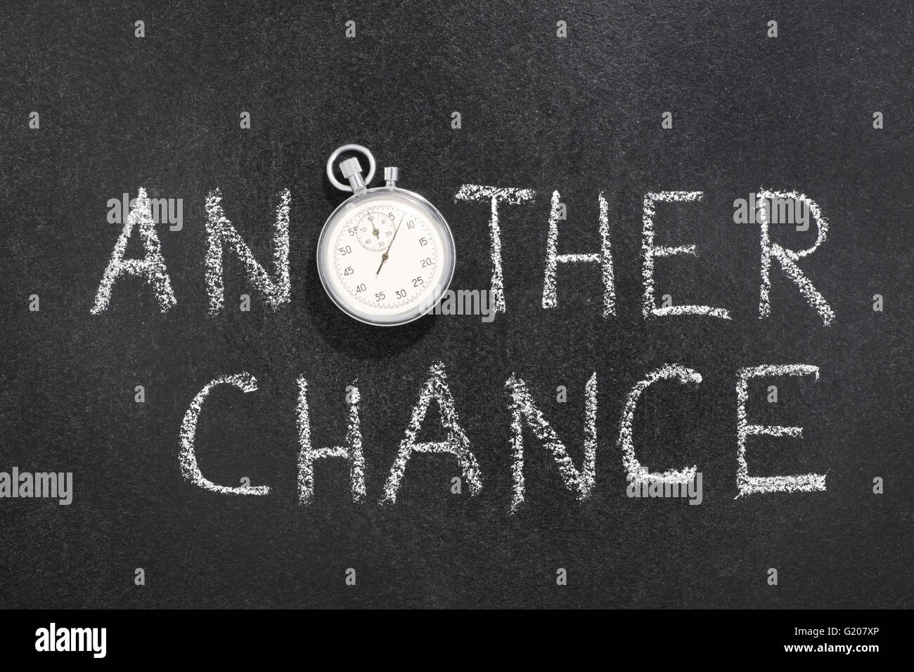 another chance phrase handwritten on chalkboard with vintage precise stopwatch used instead of O Stock Photo