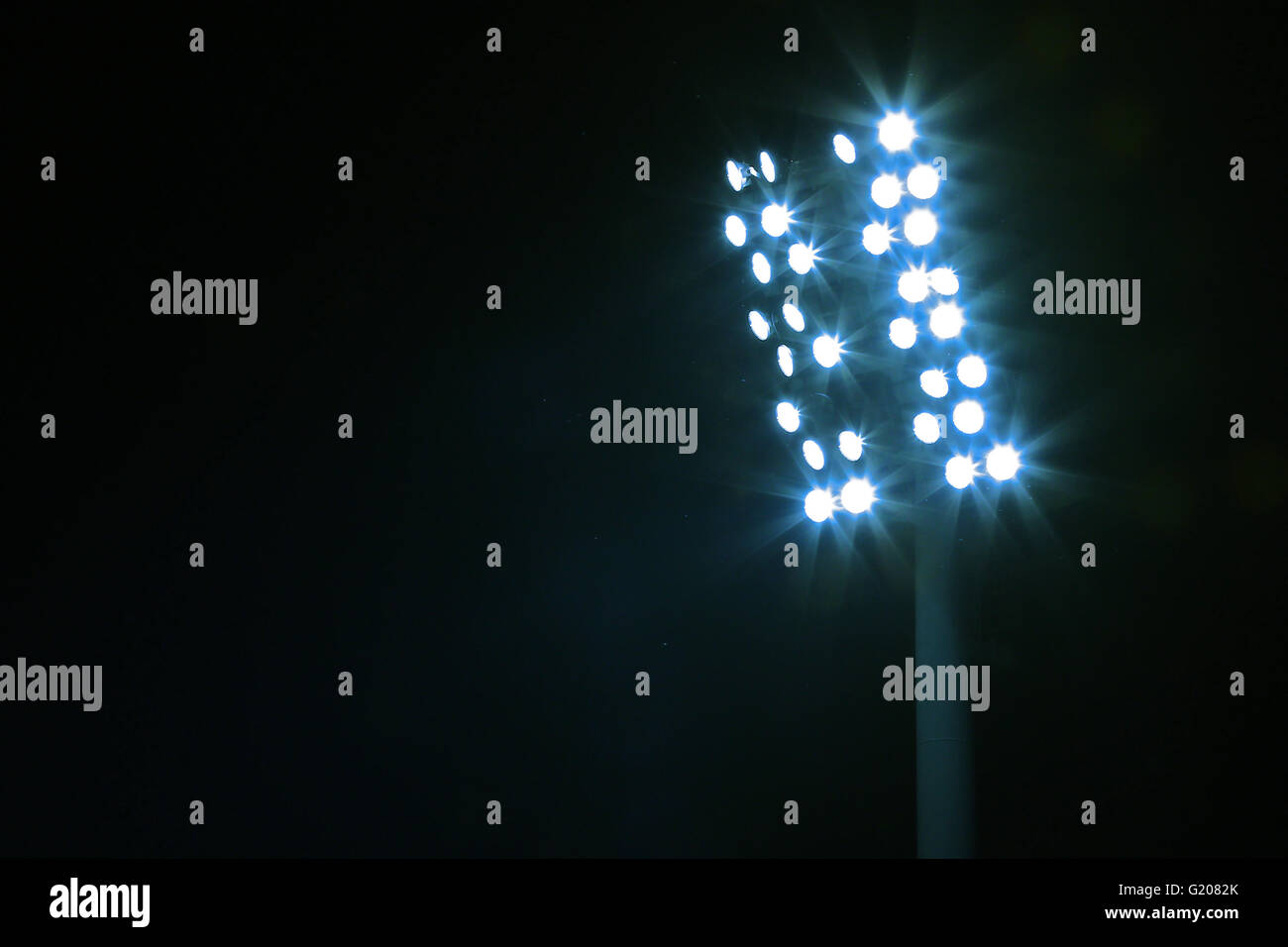 Light stack  at a sports stadium at night Stock Photo