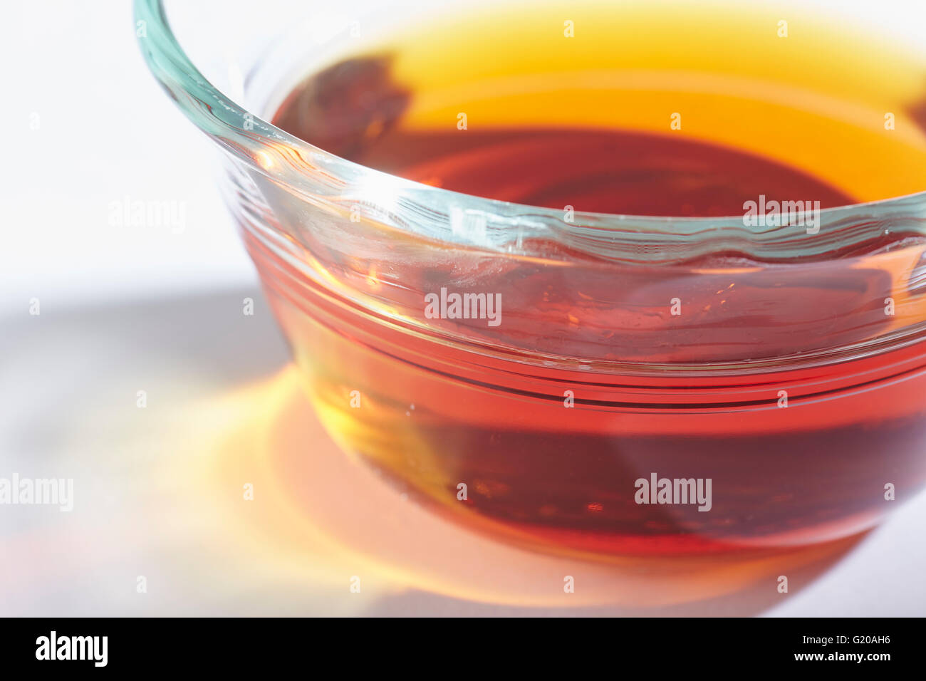 A dish of fermented fish sauce, a common condiment in Thai and Vietnamese cuisine Stock Photo