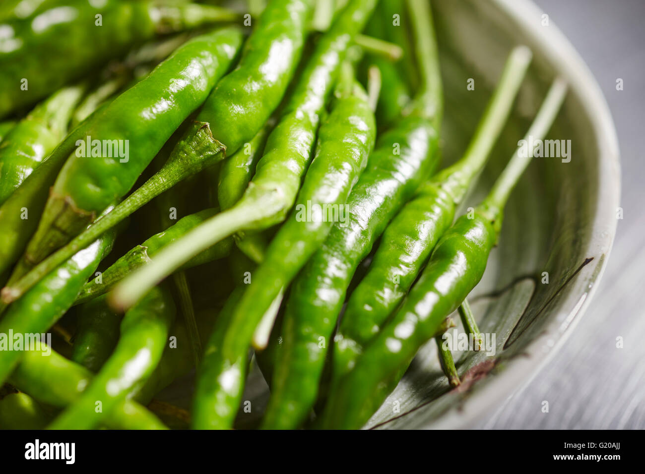 Small green chili peppers, sometimes called "Thai" chilies Stock Photo