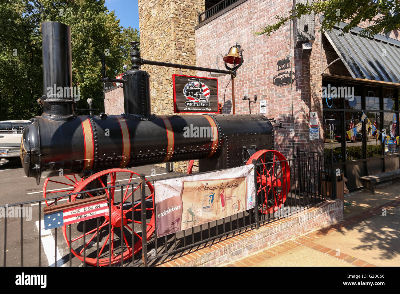 Exterior view of the Whistle Stop cafe and old railroad engine in 