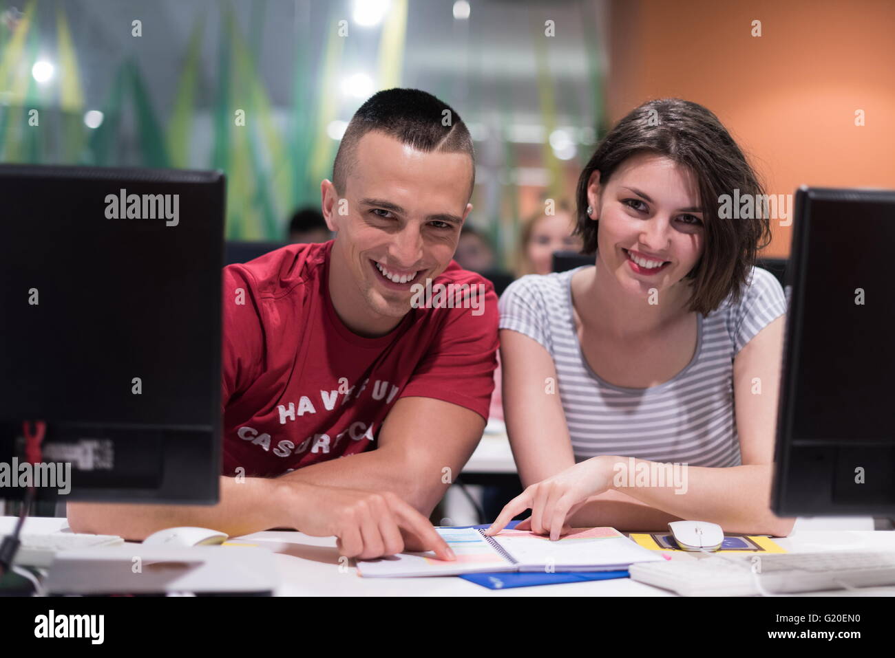 technology students group in computer lab school classroom working on ...