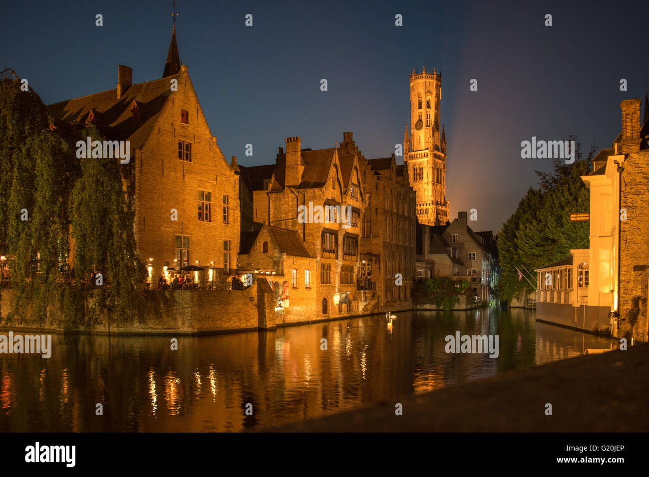 The view of the Belfry at night, Bruges, West Vlaanderen Flanders, Belgium, Europe from the Rozenhoedkaai. Stock Photo