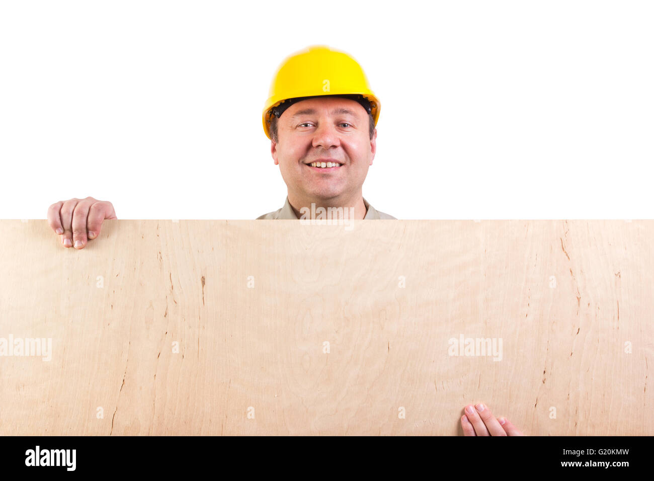 worker holding a plywood, clipping paths included Stock Photo Alamy