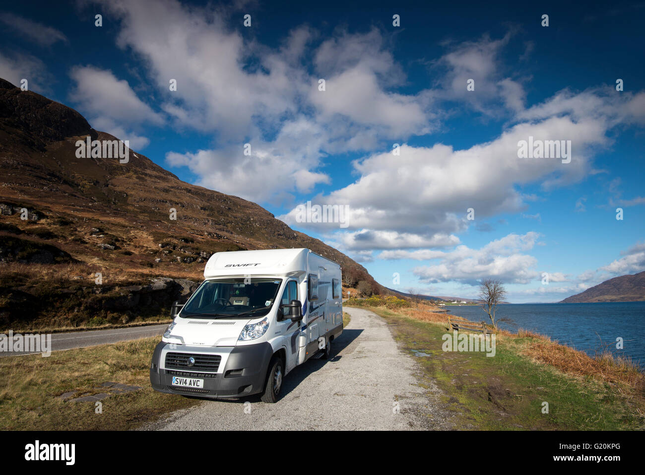 Motorhome parked up by Little Loch Broom near Dundonell, Ross and Cromarty in Scotland UK Stock Photo