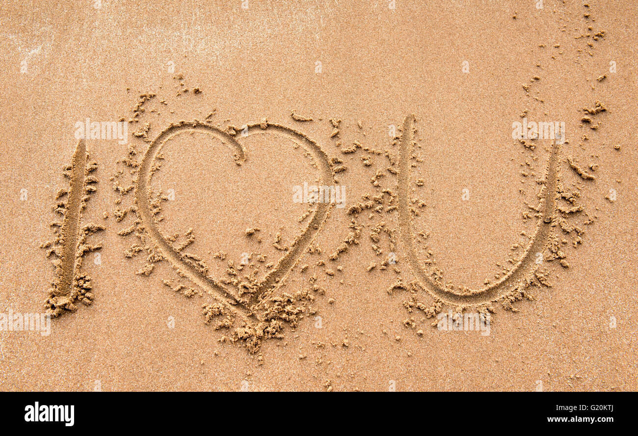 I love you written in sand on the beach Stock Photo - Alamy
