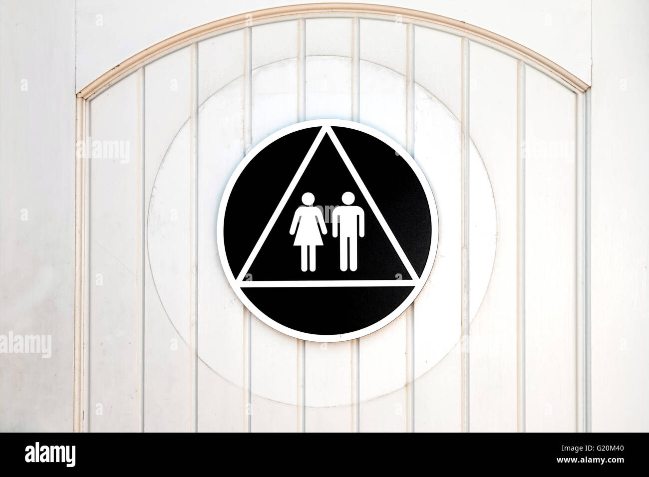 Two gender bathroom sign on door. Stock Photo