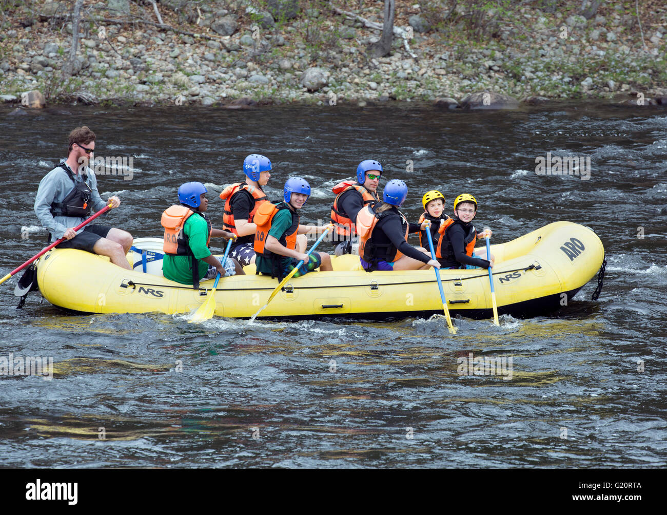Family and friends on a river rafting trip. Stock Photo