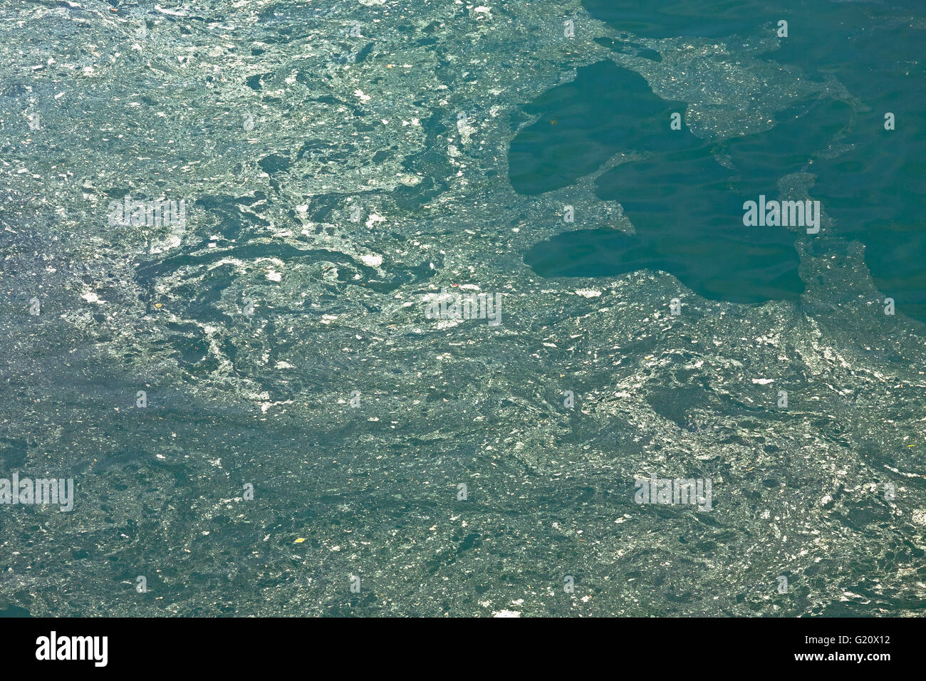 Dirty and polluted river water Stock Photo