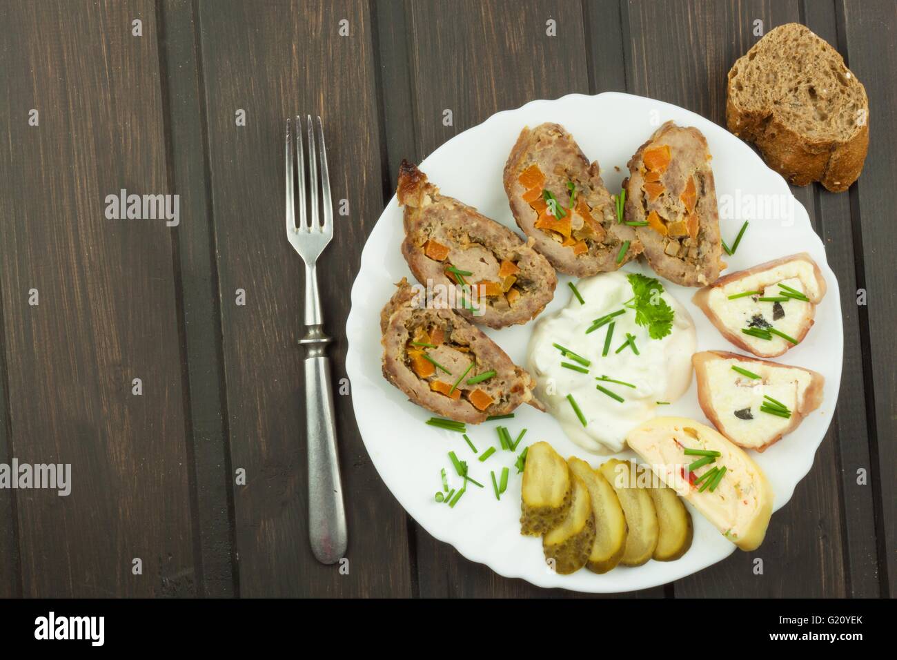 Baked roll with minced meat, cheese rolls and mayonnaise. Homework