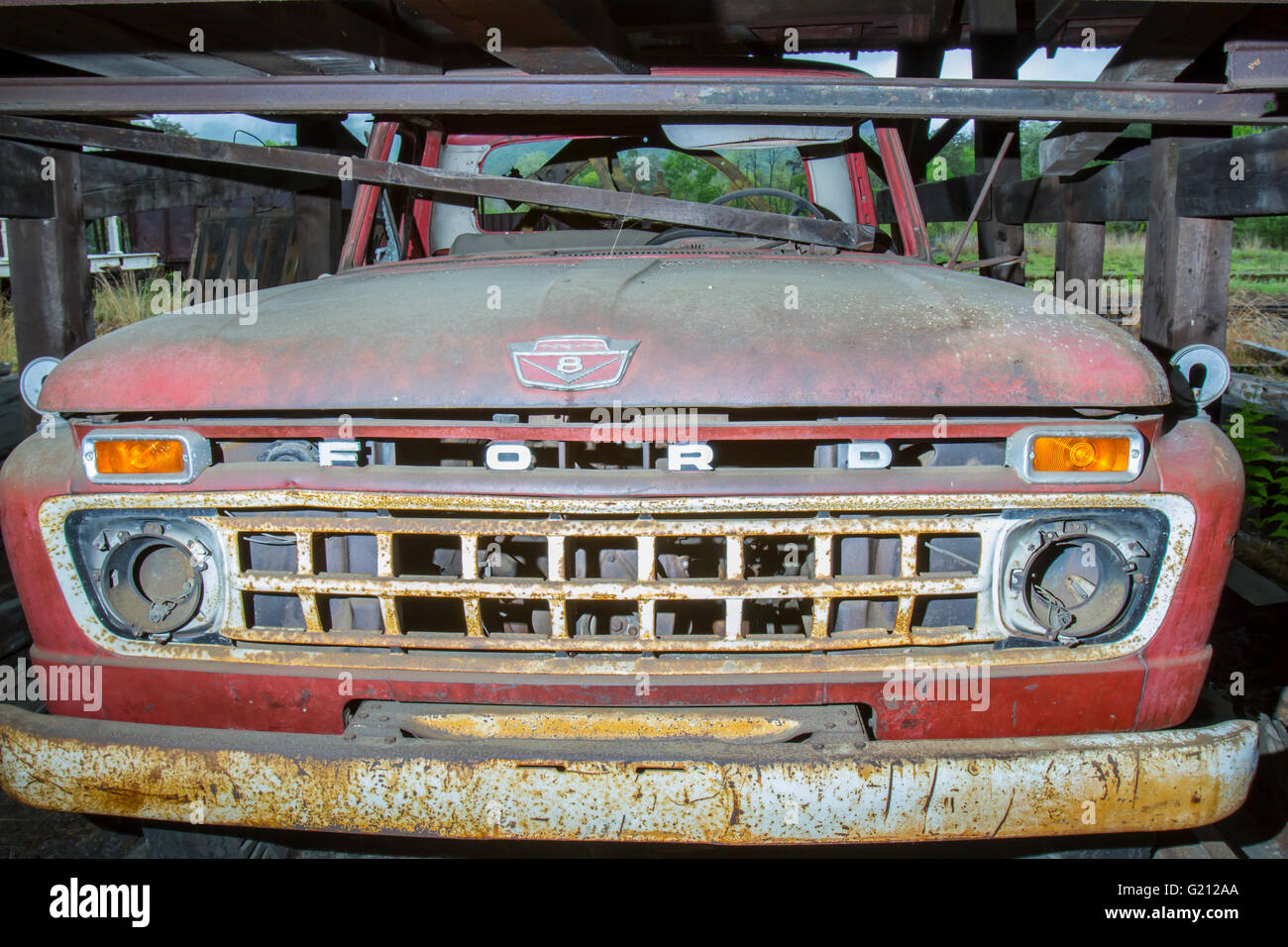 Rockhill, PA, USA - May 21, 2016 :  Old Ford truck in abandoned maintenance shed. Stock Photo