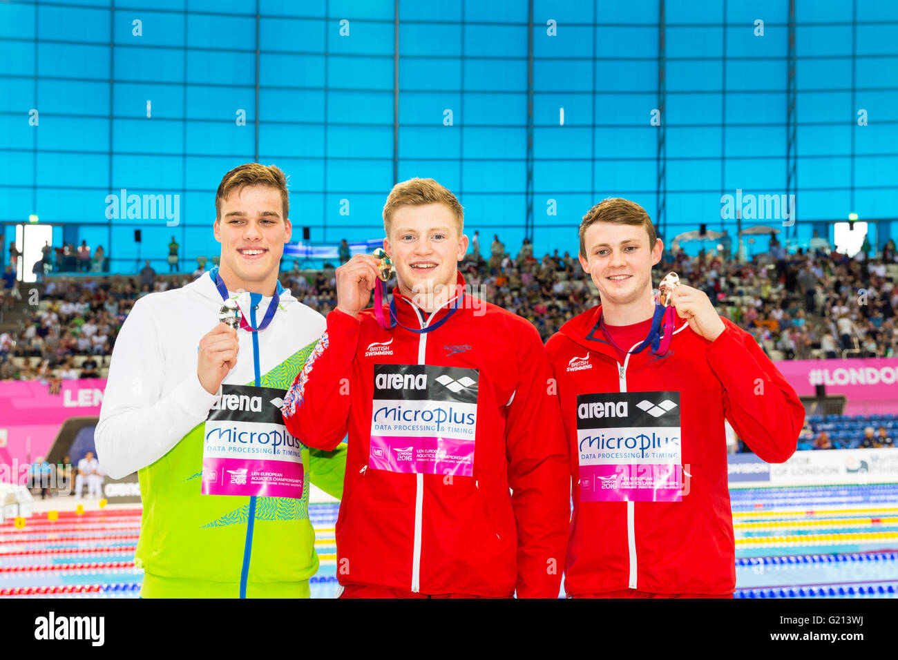 Aquatics Centre, London, UK, 21st May 2016. European Swimming Championships. Men's 50m breaststroke final. The winners show off their medals, Stevens (l), Peaty (m), Murdoch (r). British favourite Adam Peaty wins the gold medal in 26.66, with 2nd British swimmer Ross Murdoch taking Bronze in 27.31, whilst silver goes to Slovenian Peter John Stevens in 27.09. Credit:  Imageplotter News and Sports/Alamy Live News Stock Photo