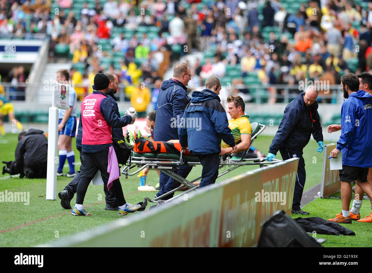 London, UK. 21st May, 2016. Medical personnel taking Lucas Muller (BRA) to the medical centre. Muller was left lying on the pitch in agony after an aggressive tackle in the pool match with Russia, HSBC World Rugby Sevens Series, Twickenham Stadium, London, UK. He was eventually stretchered off the pitch. Russia went on to win the match by 14-5. Credit:  Michael Preston/Alamy Live News Stock Photo