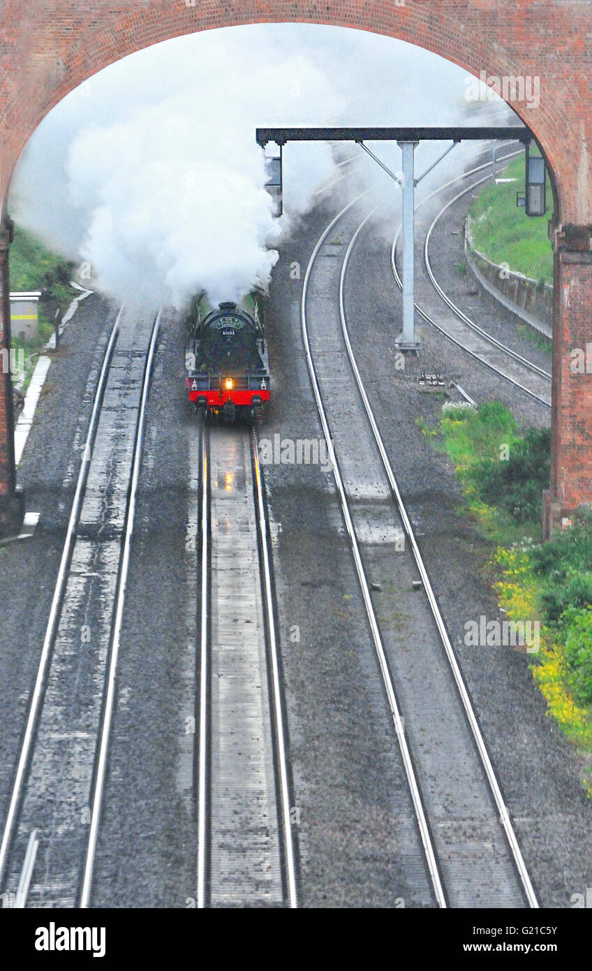 near Reading, Berkshire, UK. 21st May, 2016. The Flying Scotsman steams up the Reading straits  towards Twyford at 19.14 BST  Reminiscent of a typical scene from the 1930/ 40s in  the era of the Great Days of Steam Transport , the special train's run saw it steam through the Thames Valley, and a  round-trip via Southampton and back to London Paddington shortly before 21:40.BST . Stock Photo