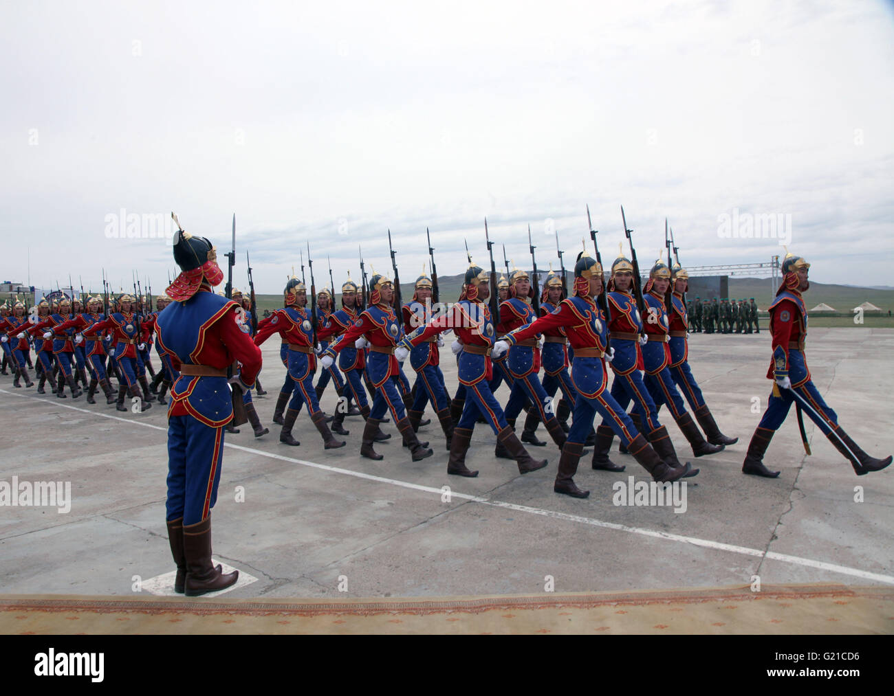 (160522) -- ULAN BATOR, May 22, 2016 (Xinhua) -- Mongolian honour guards are on a parade at the opening ceremony of the Khan Quest 2016 peacekeeping military drill in Tavan Tolgoi, Mongolia, May 22, 2016. Mongolia. Mongolia kicked off its annual multinational peacekeeping drill on Sunday, with an eye to boosting military-to-military interoperability on peacekeeping missions. Military personnel from 47 countries in five continents have arrived in Tavan Tolgoi, a Mongolian military training ground about 65 kilometers away from Ulan Bator, capital of Mongolia, for the military exercise code-named Stock Photo