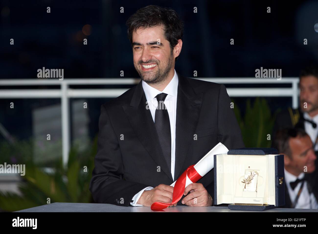 Cannes, France. 22nd May, 2016. Actor Shahab Hosseini, Best Actor Award winner for his role in the film 'Forushande' (The Salesman), poses during a photocall after the closing ceremony of the 69th Cannes Film Festival in Cannes, France, May 22, 2016. Credit:  Jin Yu/Xinhua/Alamy Live News Stock Photo