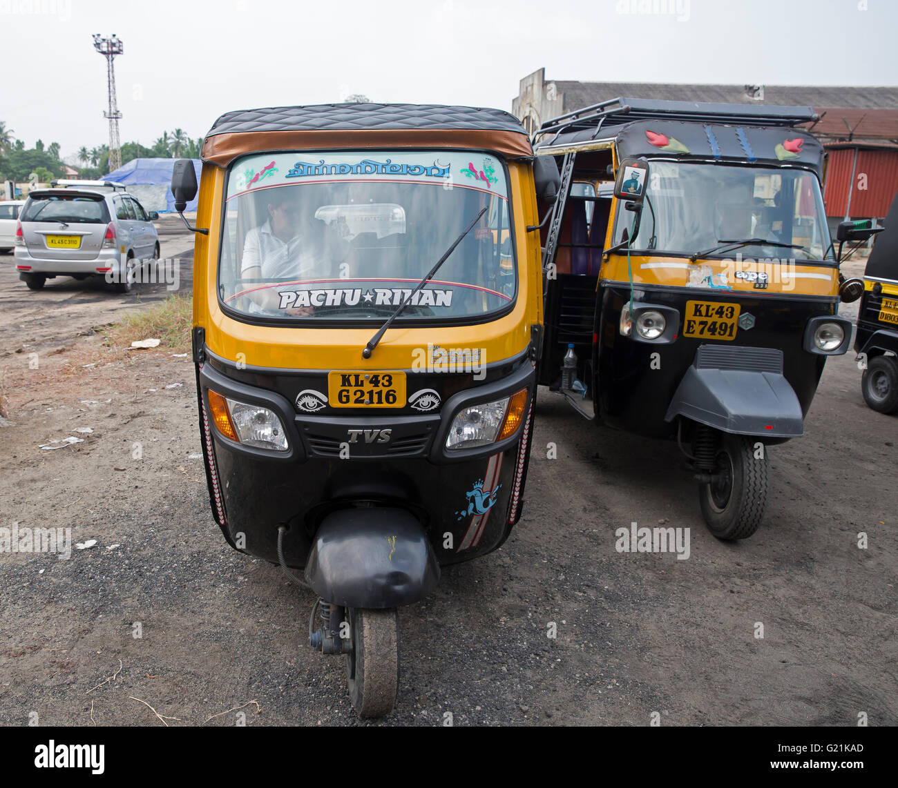 Two Tuc Tucs parked on the dockside in Cochin India Stock Photo