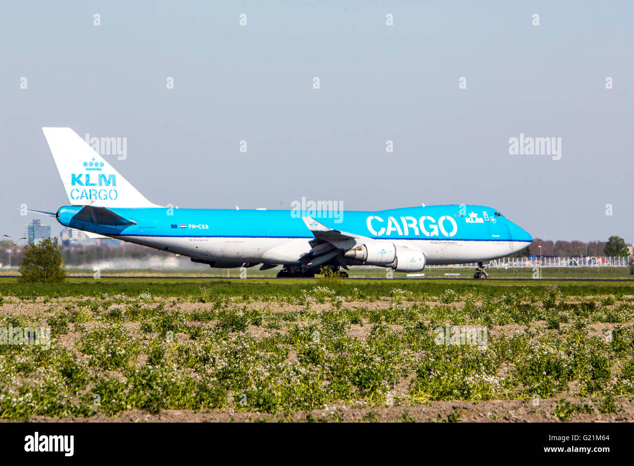 Air planes on taxiway at Amsterdam Schiphol, international airport, KLM tcargo jumbo jet, Boeing 747, Stock Photo