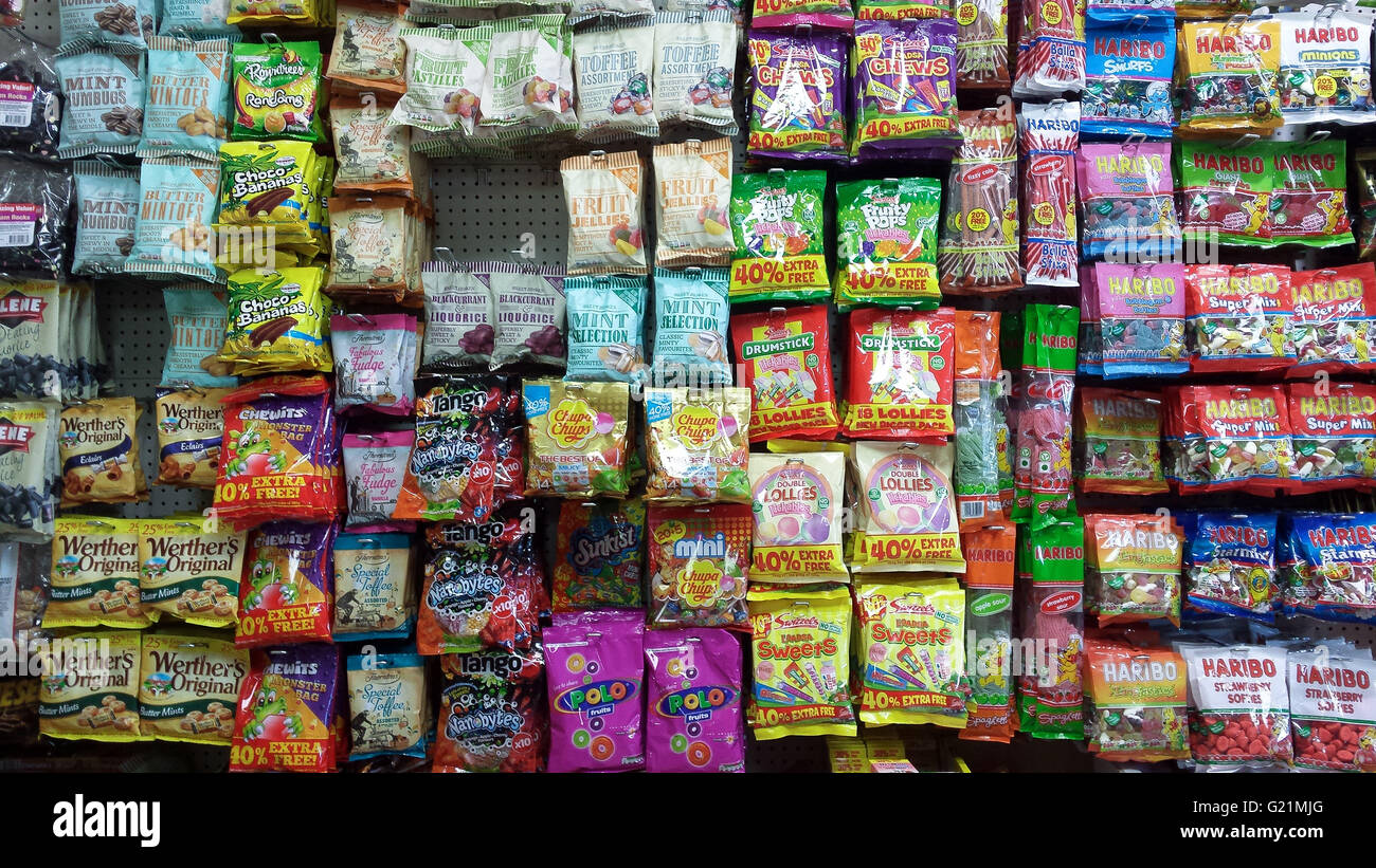 Packets of sweets in a UK supermarket Stock Photo Alamy