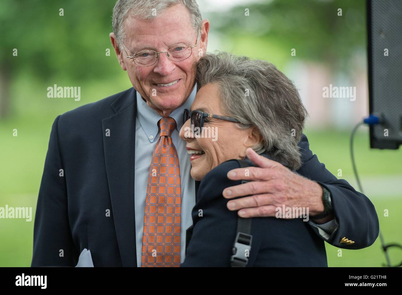 U.S Senator Barbara Boxer of California is hugged by Republican Senator Jim Inhofe of Oklahoma during a press conference on Capitol Hill May 19, 2016 in Washington, DC. Stock Photo