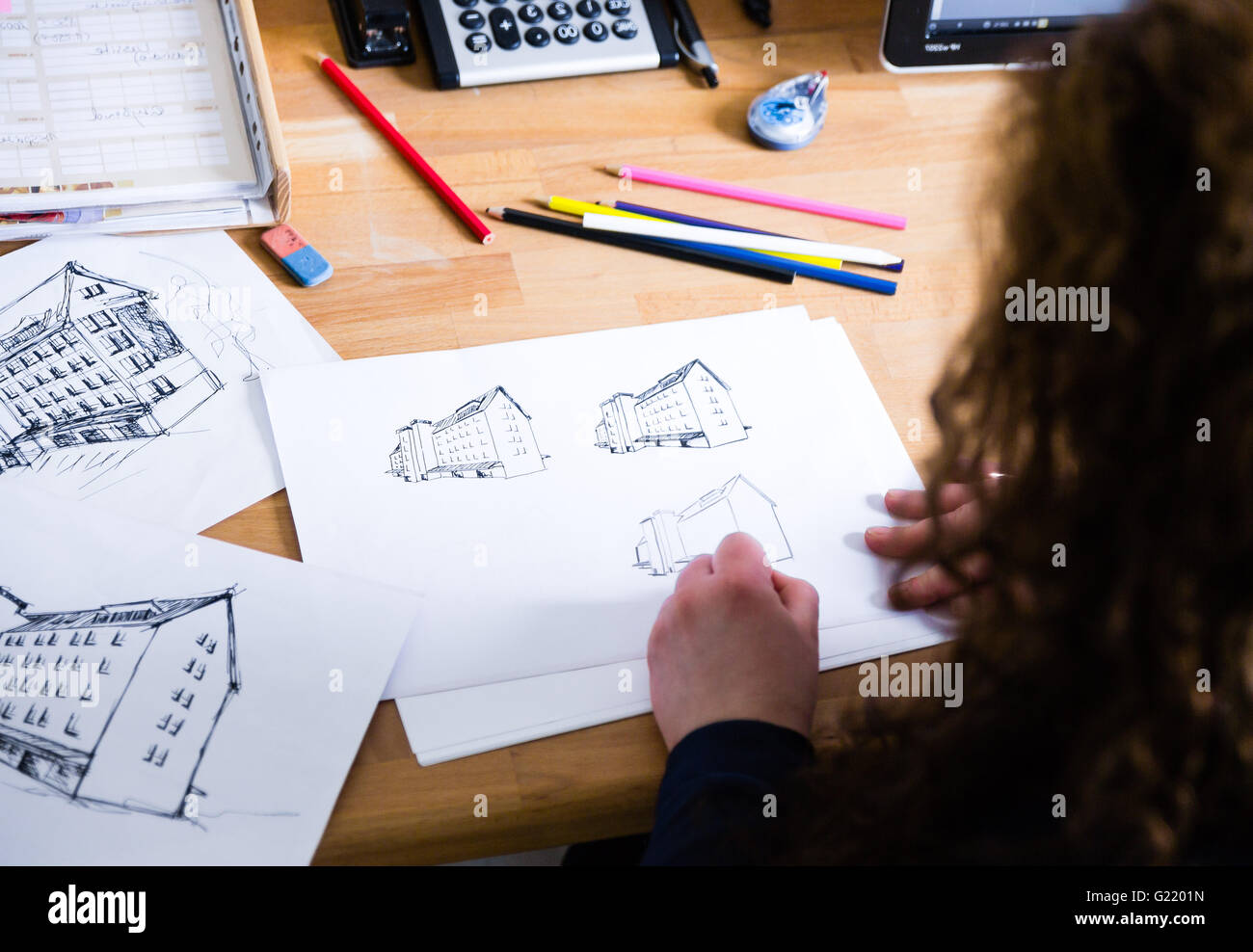Graphic designer drawing with pencil in the office Stock Photo Alamy