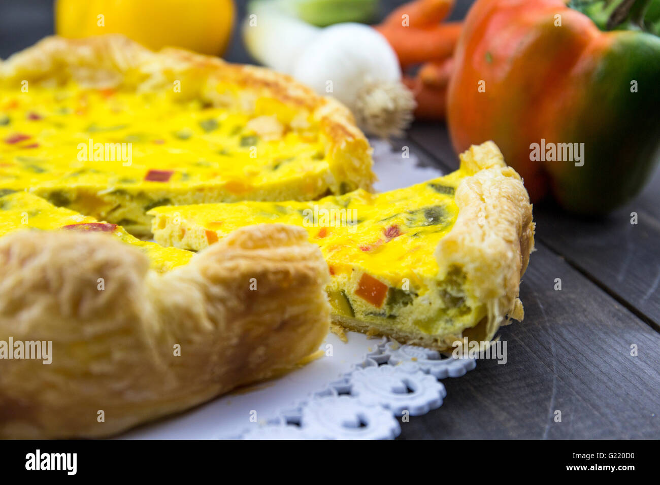 Savory pie with peppers, onion, carrots and zucchini. Stock Photo