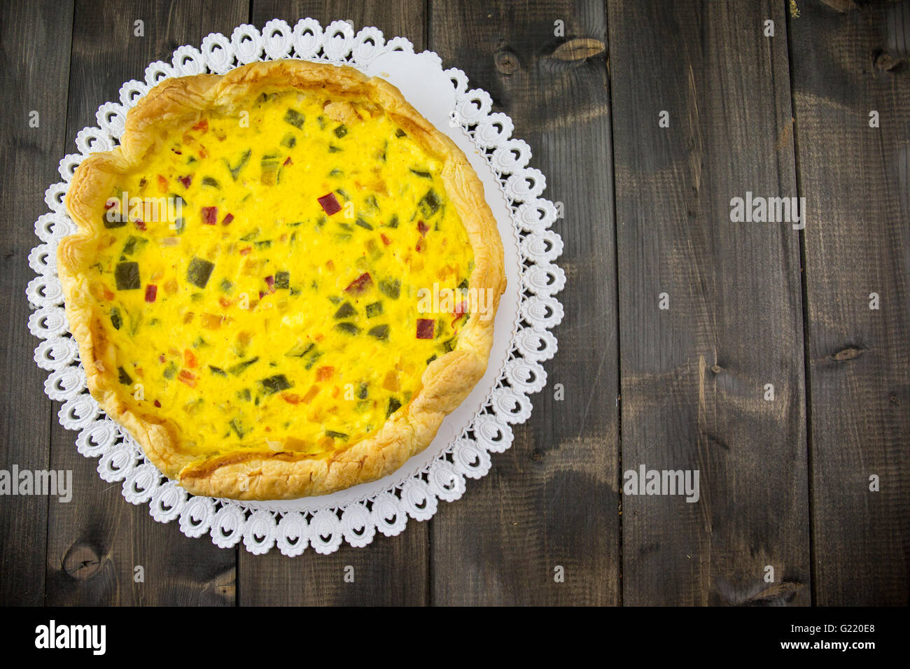 Savory pie with peppers, onion, carrots and zucchini. Stock Photo