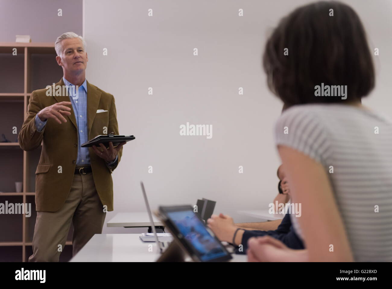 group of students study with professor in modern school classroom Stock ...