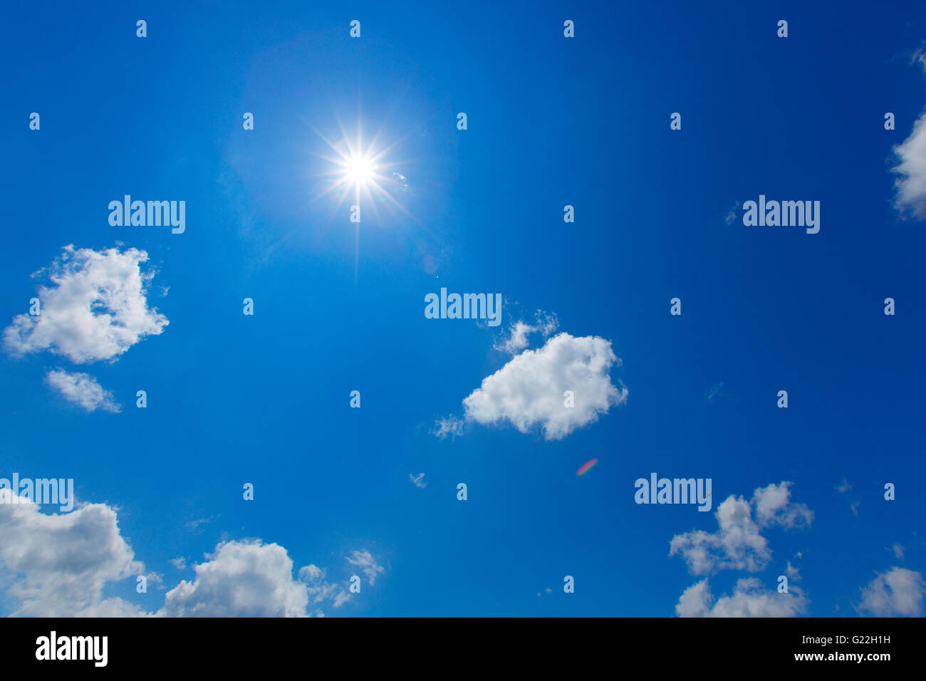 blue sky with clouds on a sunny summer day Stock Photo - Alamy