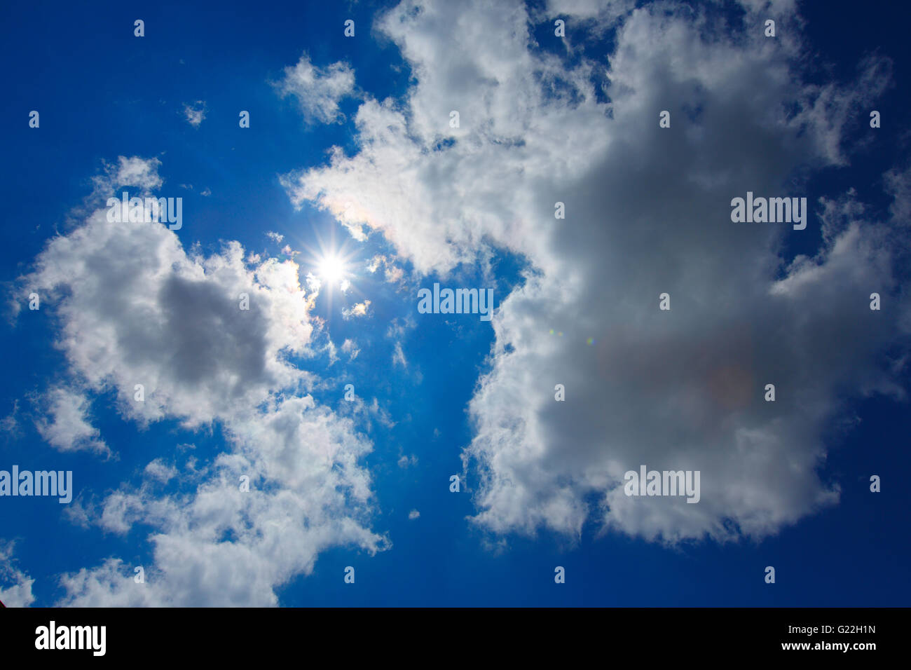 blue sky with clouds on a sunny summer day Stock Photo - Alamy