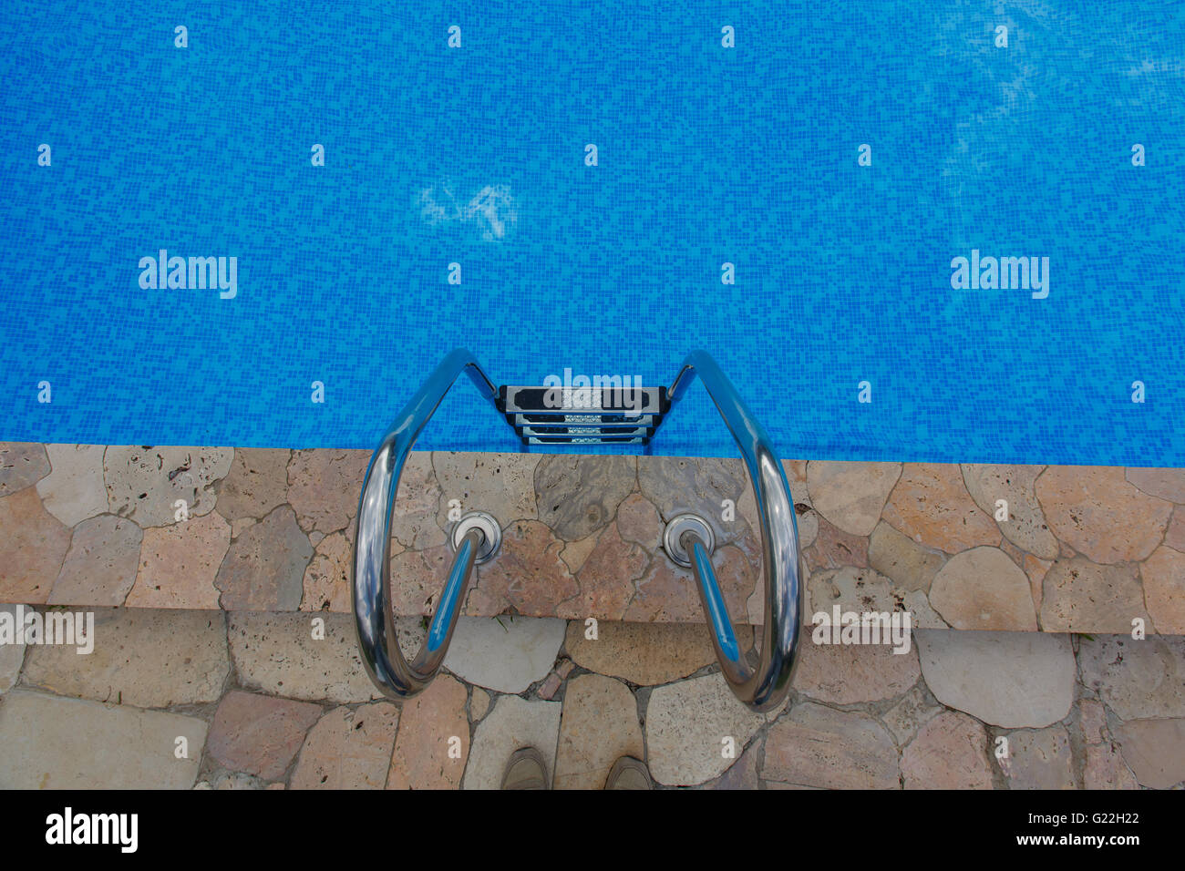 Steps into blue swimming pool hi-res stock photography and images - Alamy