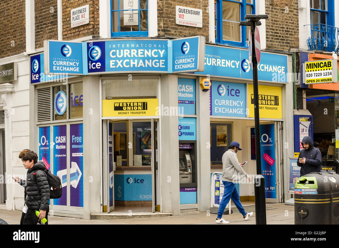 A Currency Exchange on the corner of Queensway and Inverness Place in Bayswater, London. Stock Photo