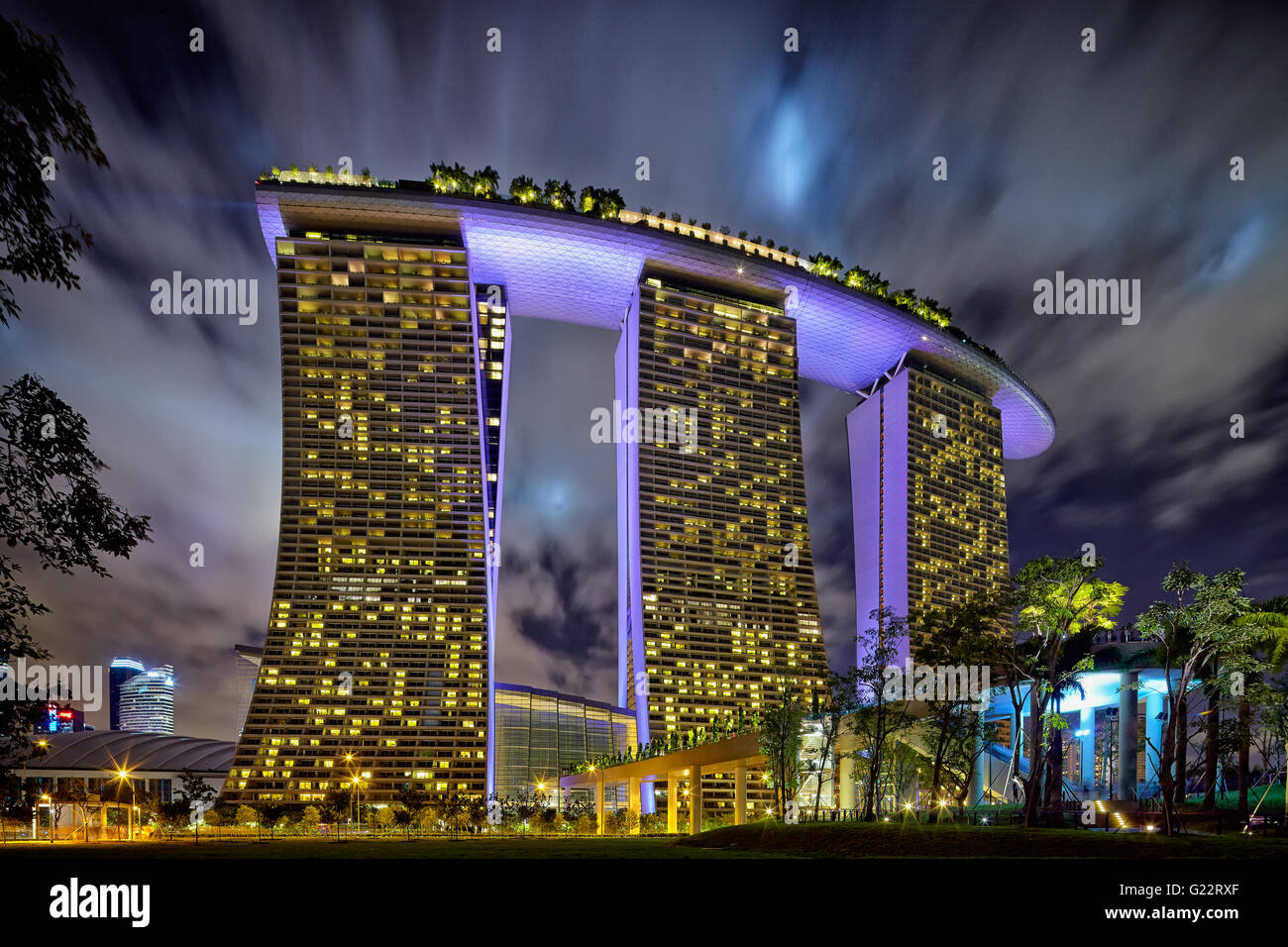 Exterior night view of Marina Bay Sands from Gardens by the Bay, Marina Bay, Singapore on July 22, 2012. Stock Photo