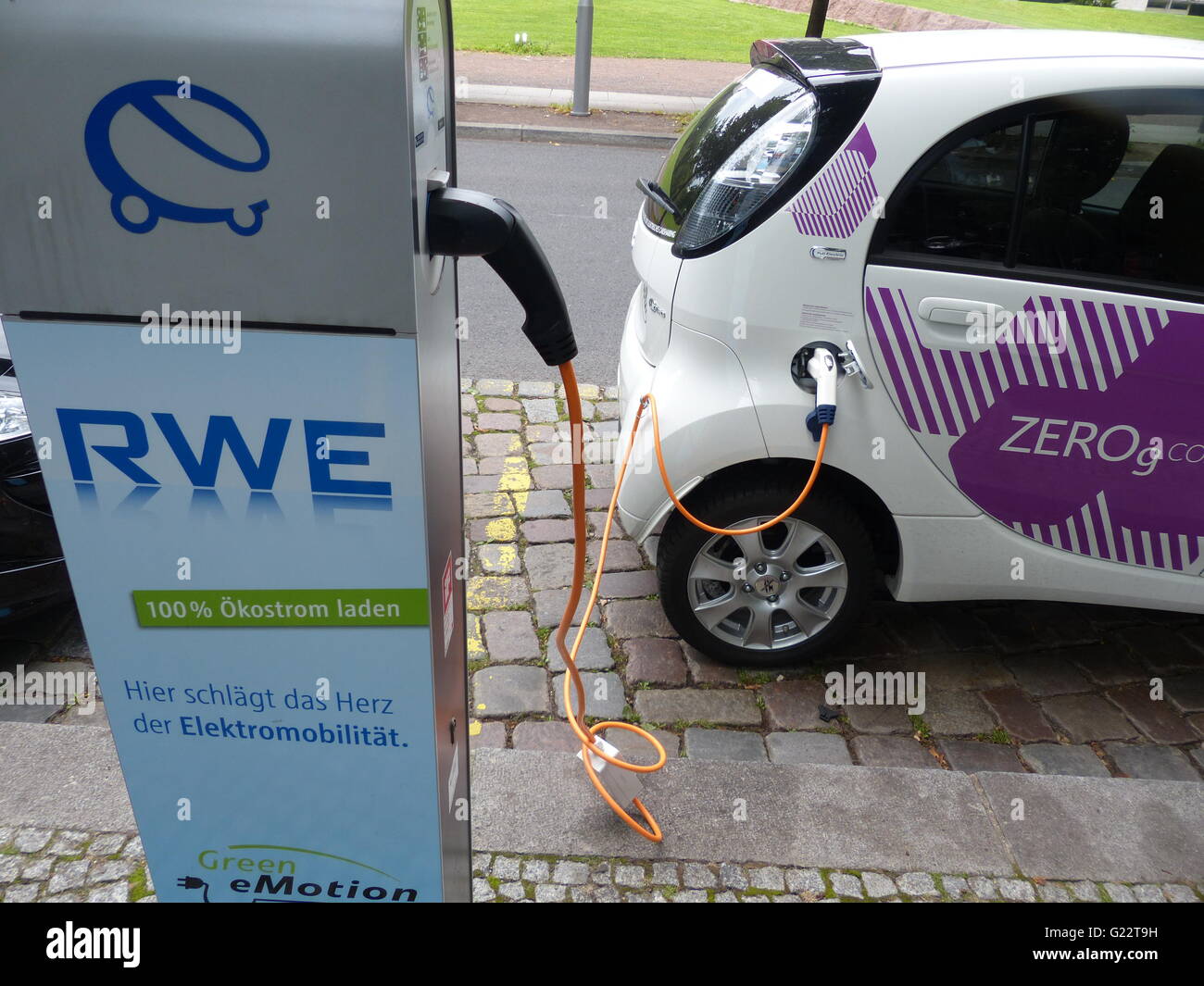 Berlin Germany. Zero emissions electric car being charged up for free