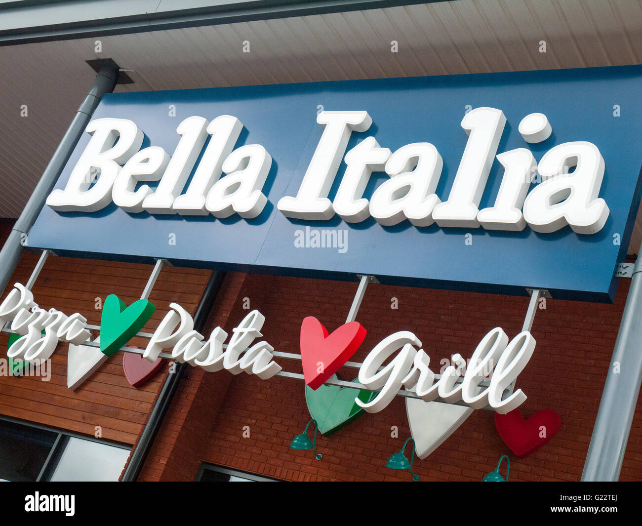 Bella Italia restaurant sign on outside wall UK Stock Photo