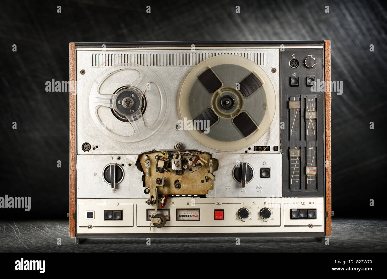 Old reel tape recorder on steel background Stock Photo - Alamy