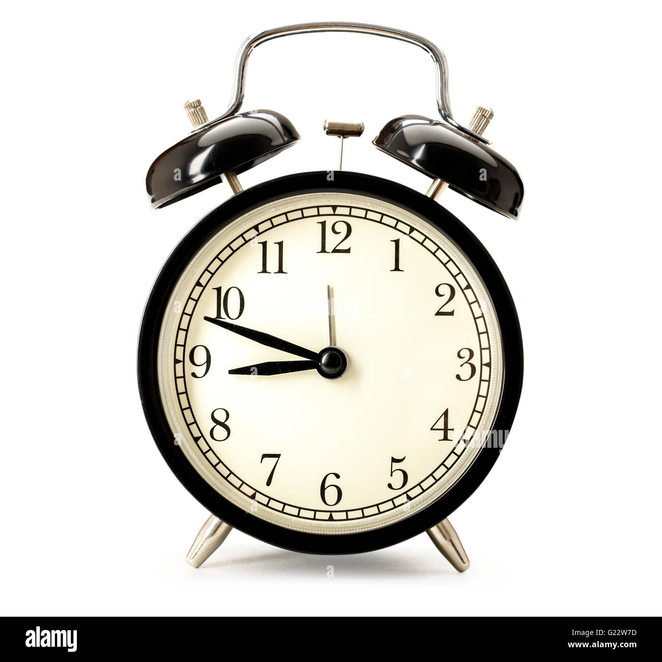Old fashioned alarm clock on white background Stock Photo - Alamy