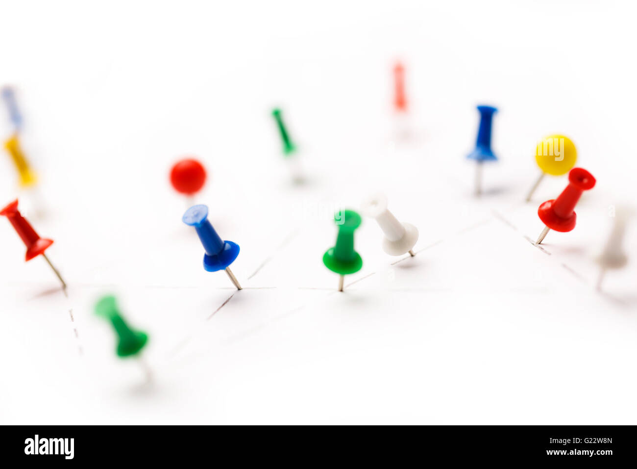 Colorful Paper Pins Attached To White Paper Stock Photo Alamy