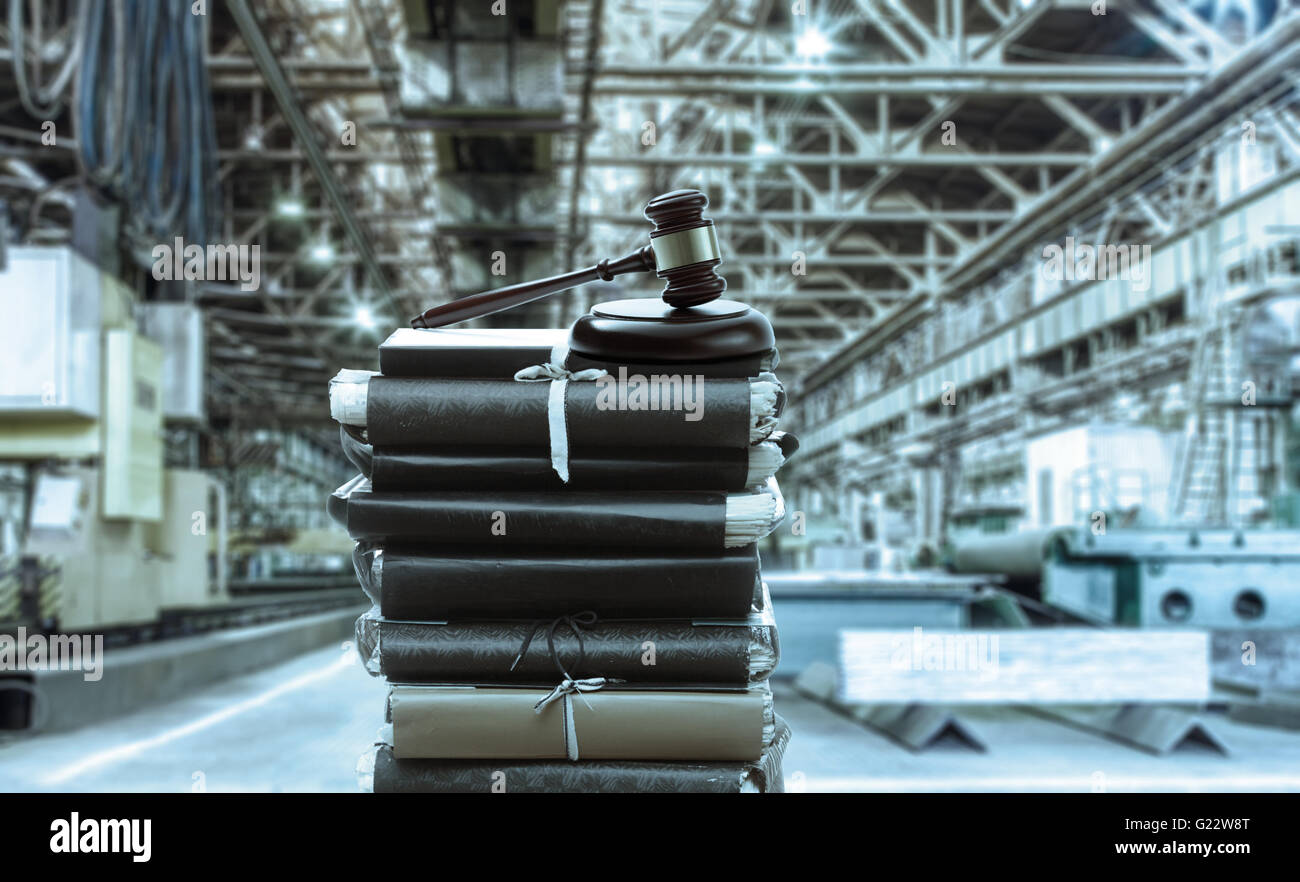 Machine shop, paper folders and gavel in toning Stock Photo - Alamy