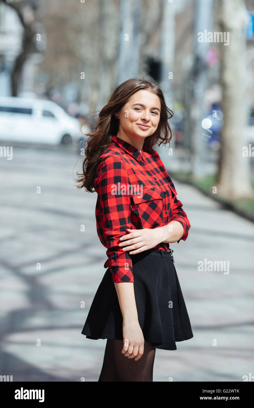 Woman standing outdoors hi-res stock photography and images - Alamy
