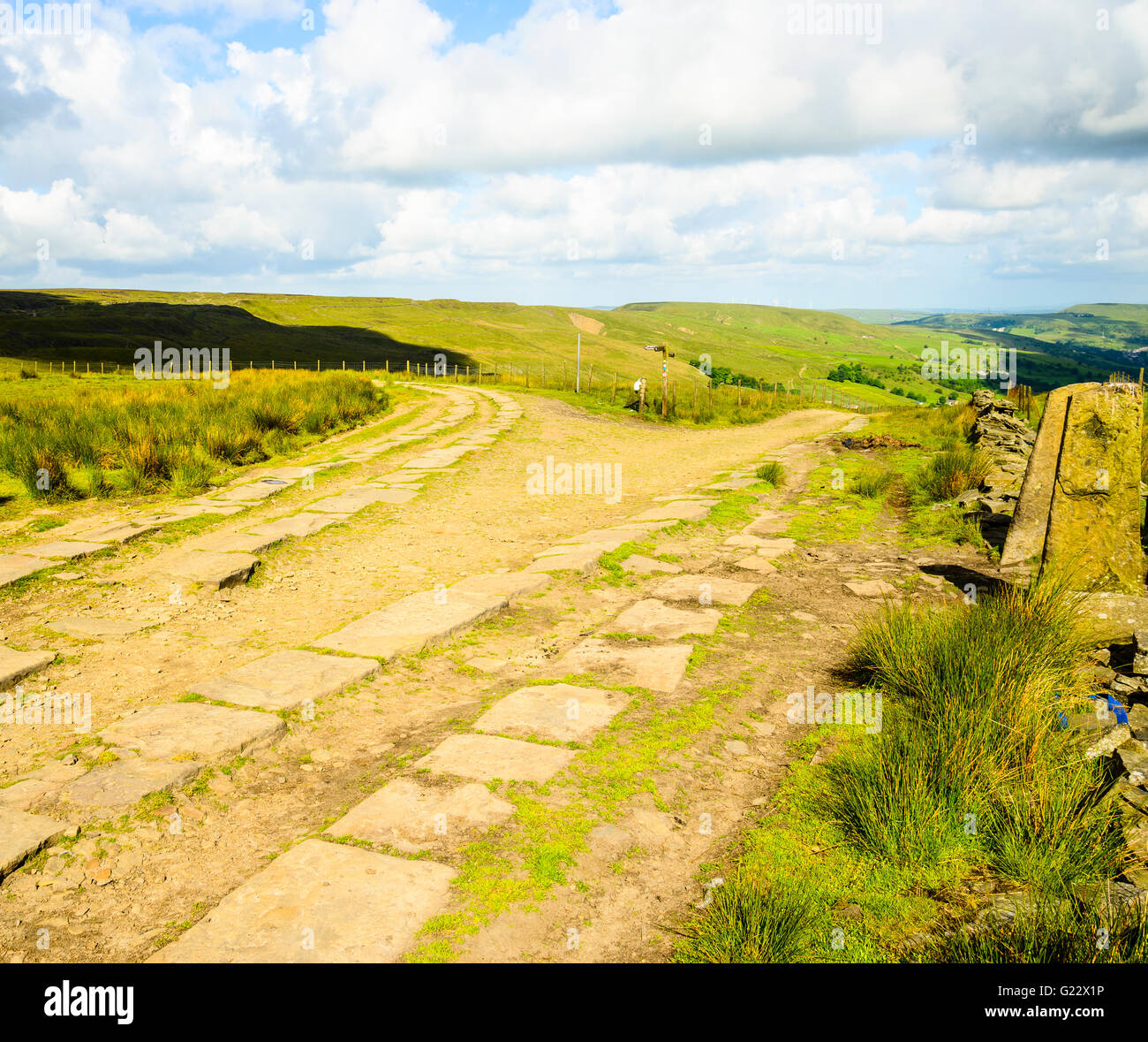 Ancient flagged tracks on the Pennine Bridleway National Trail above the Rossendale valley Lancashire Stock Photo